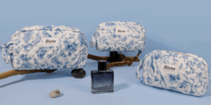 a collection of custom makeup bags with logos in various materials and styles