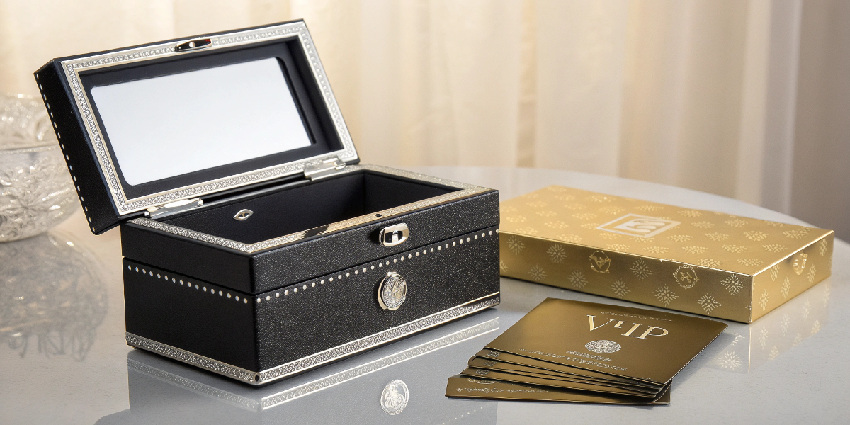 a luxury vanity box with a VIP membership card next to it