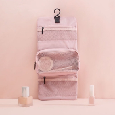 Hanging organizer route where bottle fit, hook and insert card details affect the kit brief