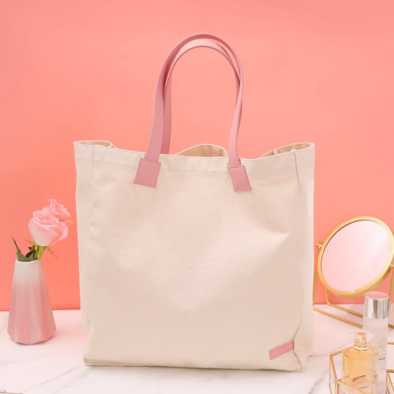 Luxury GWP tote bag in recycled canvas, designed as a gift with purchase for a skincare set.