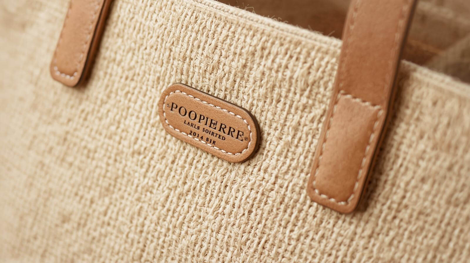 A close-up shot of a high-quality, eco-friendly tote bag's stitching and fabric texture