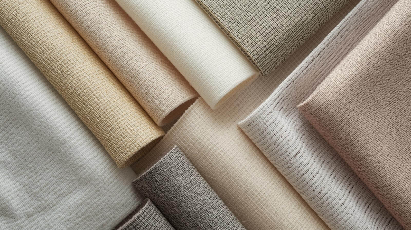 A display of various eco-friendly and high-tech fabric swatches