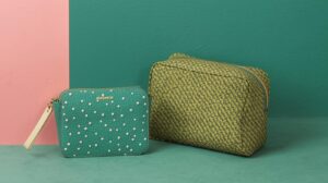A stylish cosmetic bag made from a unique vegan leather, such as apple or cactus leather