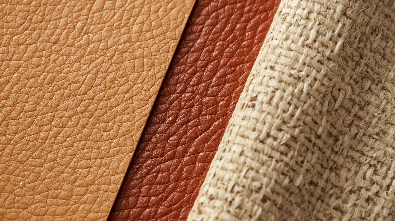 Close-up shots of various sustainable materials like apple leather and recycled textiles