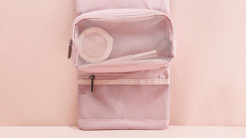 Ocean-themed wet/dry cosmetic bag made from recycled materials