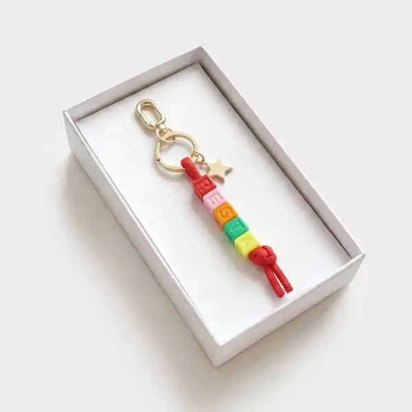 Bead string charm