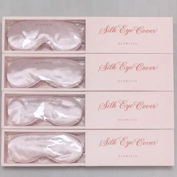 Four pink eye masks and paper boxes from a 1,500-set GWP color approval project