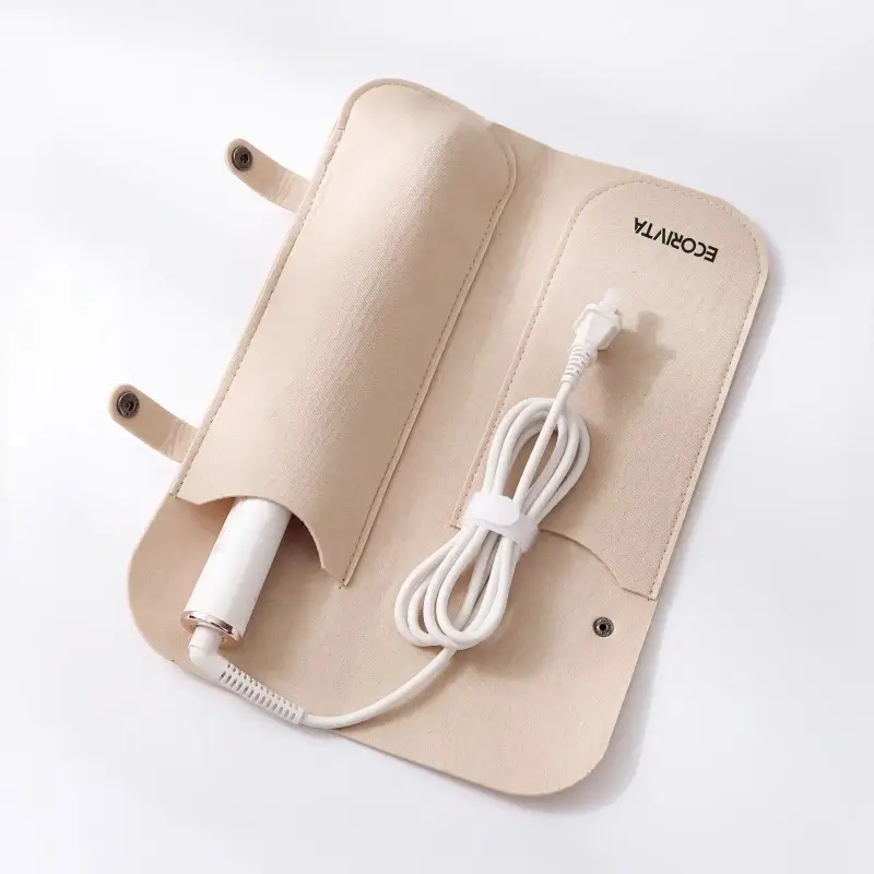 Open fold-out hair tool organizer reference with separate tool and cord pockets