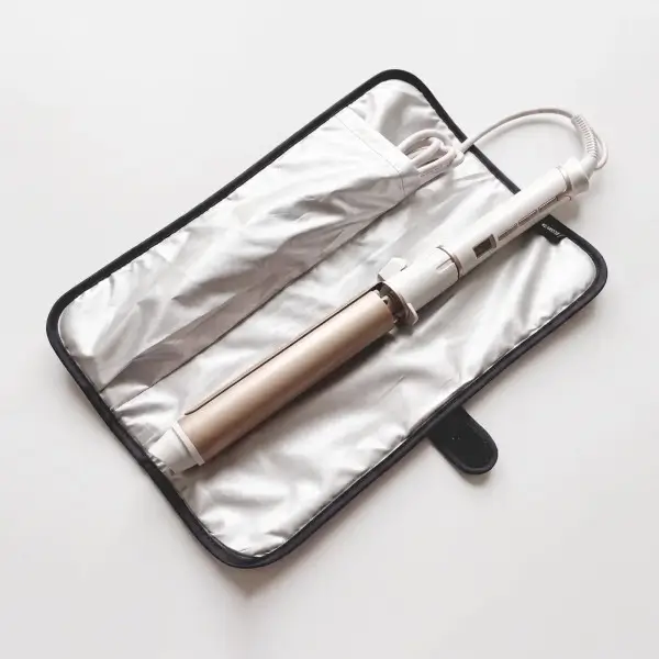 Protective sleeve route for powered-off hair tool storage